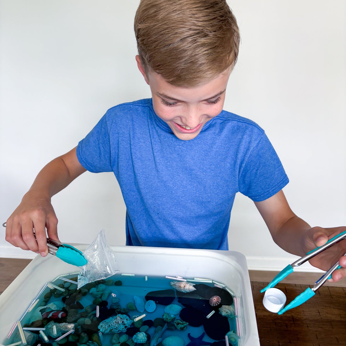 Child with Deep Blue Sea Clean up activity
